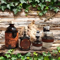 Contenants de Voyage Légendaires : Bouteilles habillage Cuir - D'Cuir